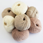 KREMKE The Merry Merino 110 – Garnknäuel in Creme-, Beige- und Rosétönen