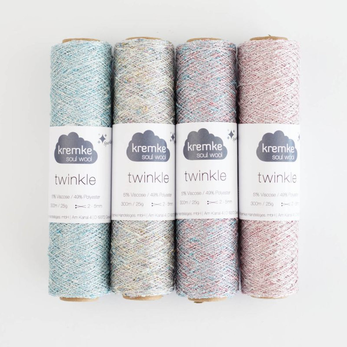 KREMKE Twinkle – vier glitzernde Garnkonen in Pastellfarben